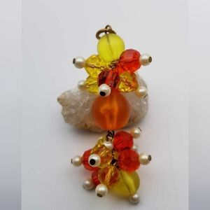 Evil eye orange jumble beaded necklace pendant